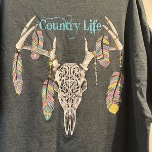 Country Life tshirt with skull head and feathers on back